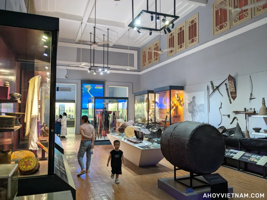 Visitors and indoor exhibits at the History Museum of Ho Chi Minh City