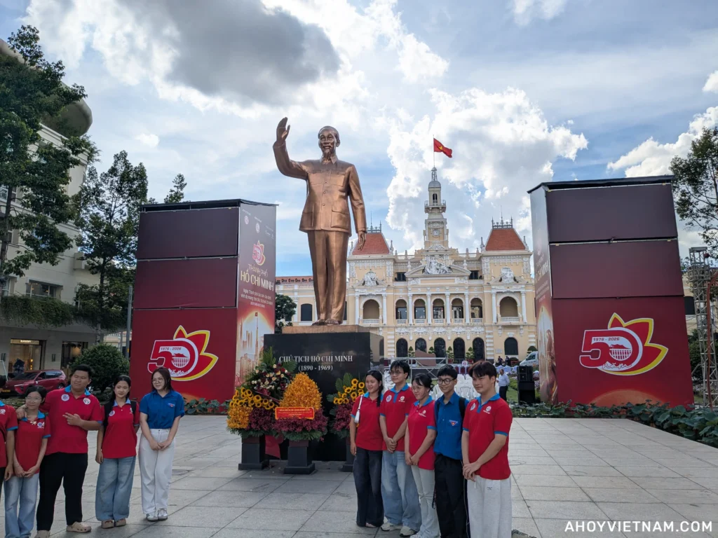 Students posing in front of the Ho Chi Minh Statue in Vietnam