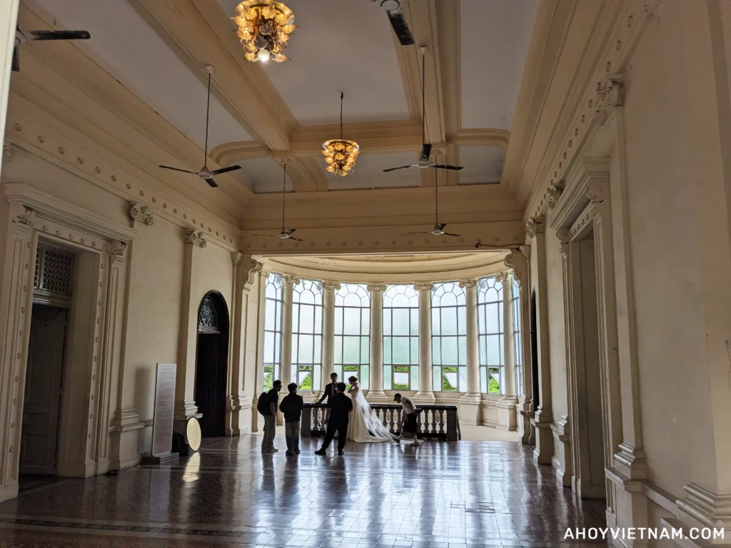 A couple having their wedding photos taken inside the Museum of Ho Chi Minh City in Vietnam
