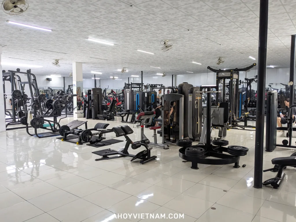 A large amount of exercise machines and equipment inside HL Fitness Center in Da Nang, Vietnam