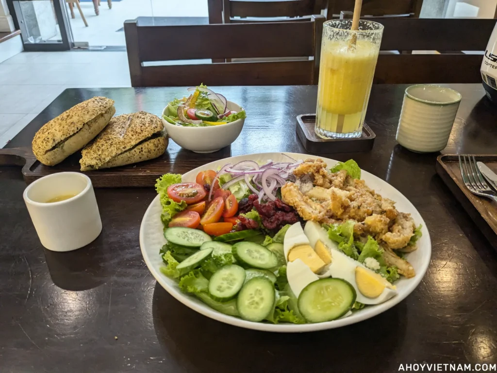 A chicken pesto panini and a garlic Parmesan chicken salad from Eco Green Cafe & Bistro in Da Nang.