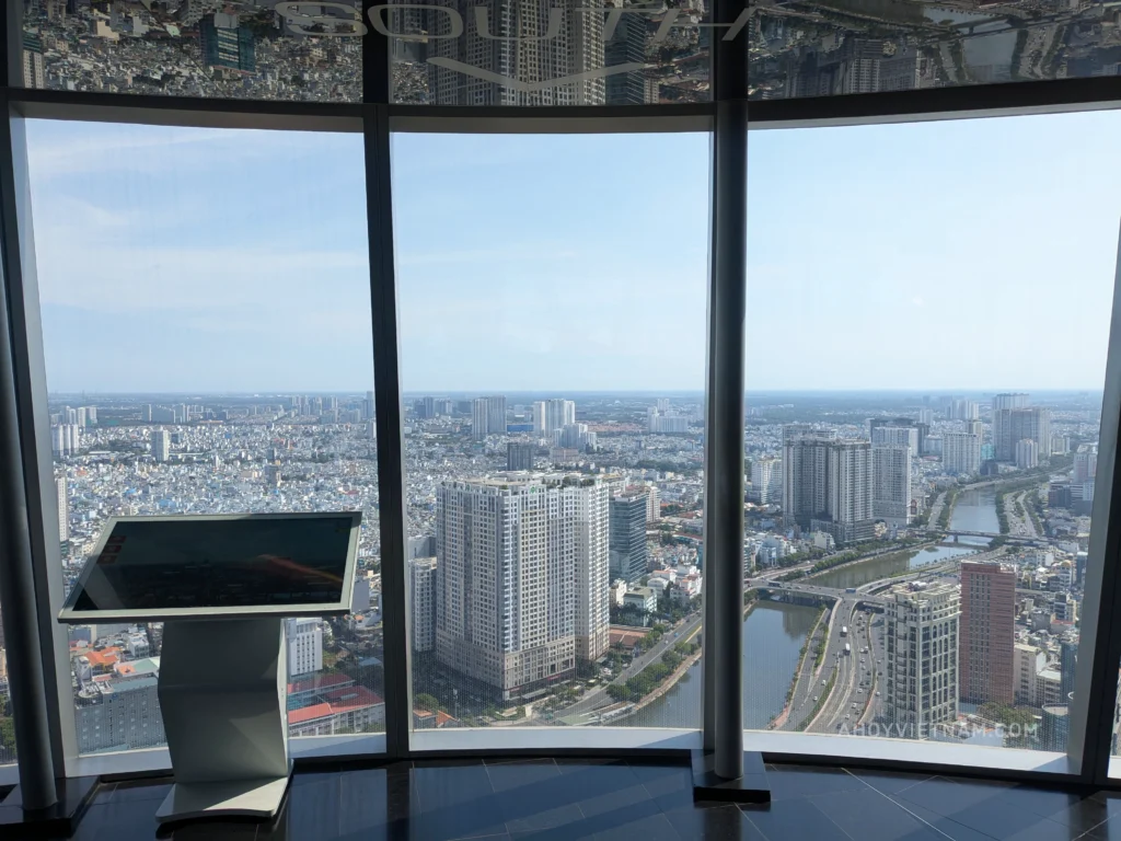 Viewing District 4 from inside the Saigon Skydeck's 49th floor observatory.