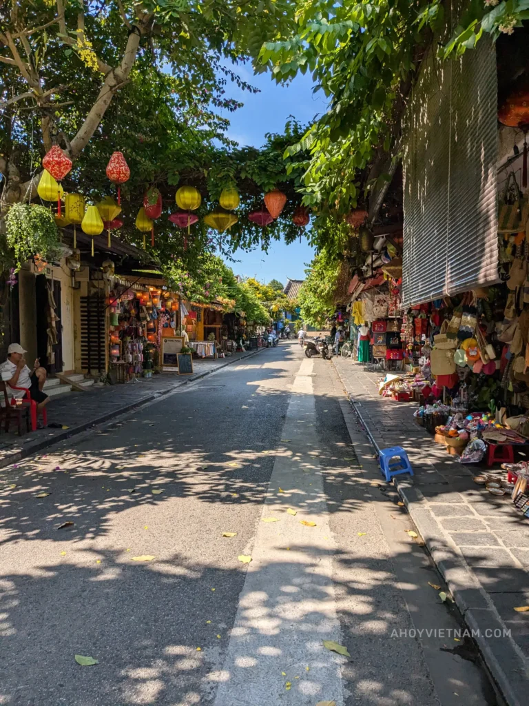 Lanterns and souvenirs for sale on a small street in Hoi An in September.