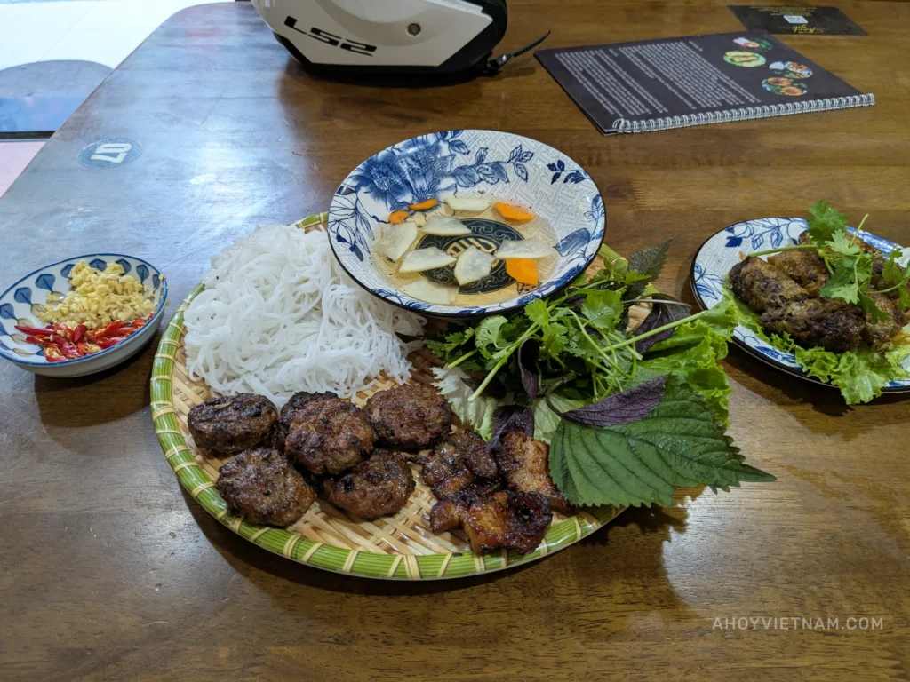 Bun cha and fried spring rolls at a restaurant in Da Nang, Vietnam.