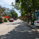 On Nguyen Dinh Tran, a residential street lined with houses and apartments in Da Nang, Vietnam.