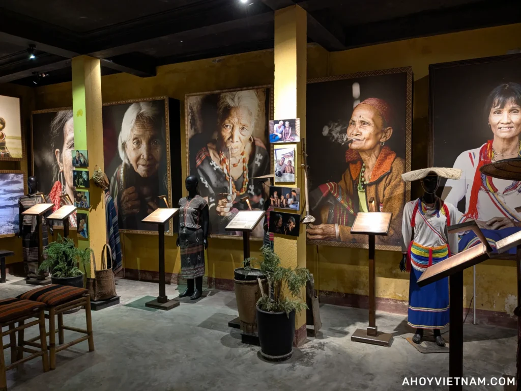Photographs and costumes inside the Precious Heritage Museum and Art Gallery in Hoi An