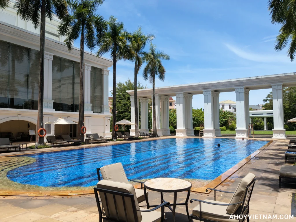 The huge outdoor swimming pool at Indochine Palace Hue, for those wondering where to stay in Hue with a pool