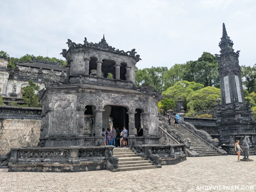 Tourists exploring the grounds of Khai Dinh tomb in Hue, Vietnam