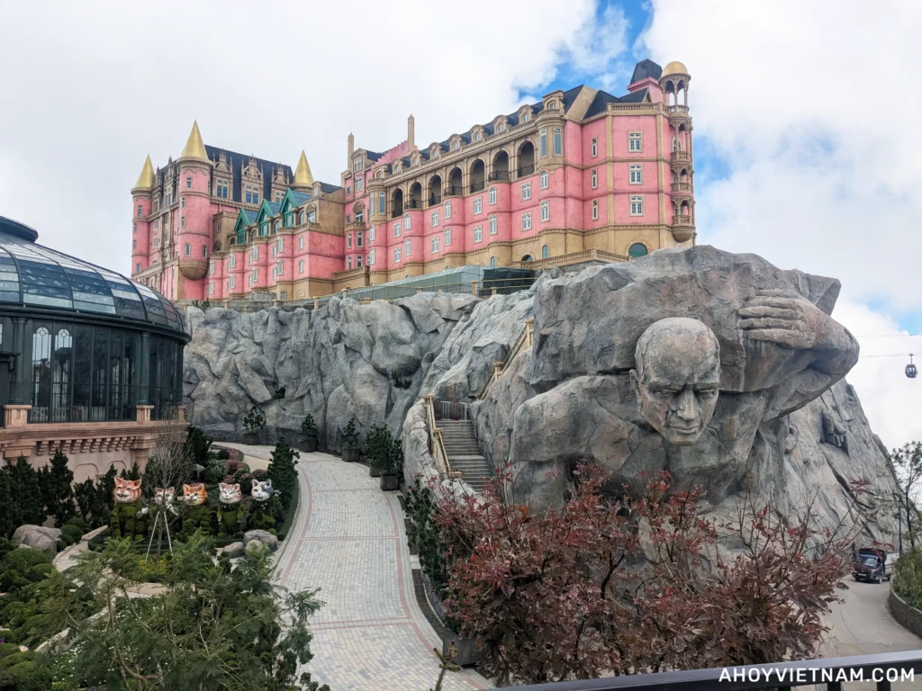 The Atlas Statue beneath the pink castle at Ba Na Hills in Da Nang, Vietnam