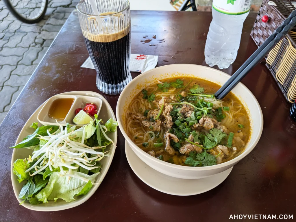 Black iced coffee and bun bo Hue at N. Cafe and Restaurant in Hue, Vietnam