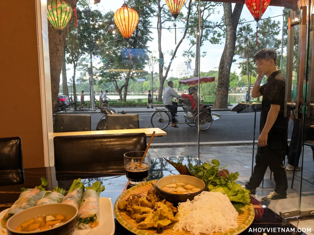 Eating bun cha across from Hoan Kiem Lake in Hanoi