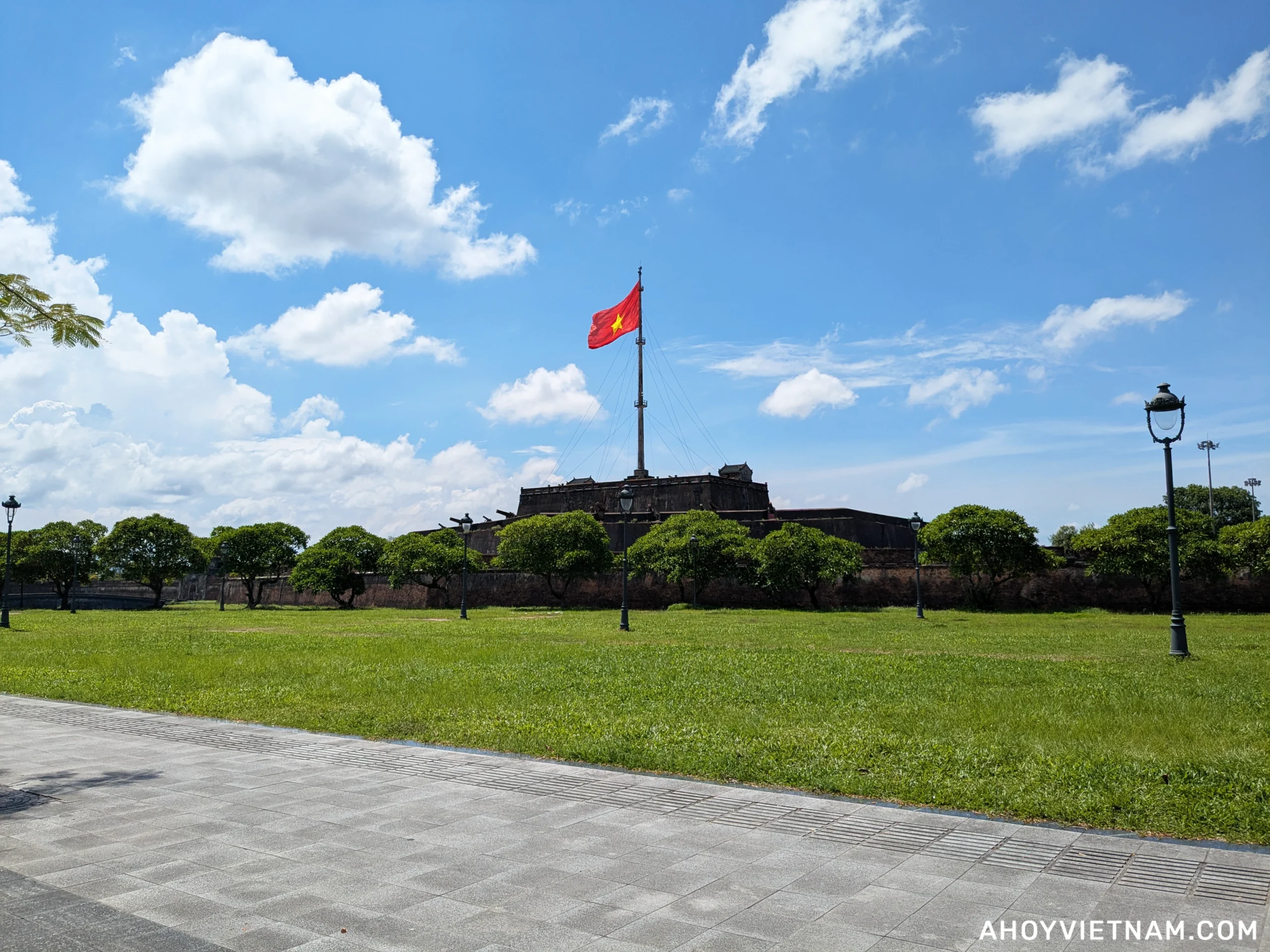 The Vietnamese flag on top of the Hue Flag Tower (Ky Dai) in Hue, Vietnam