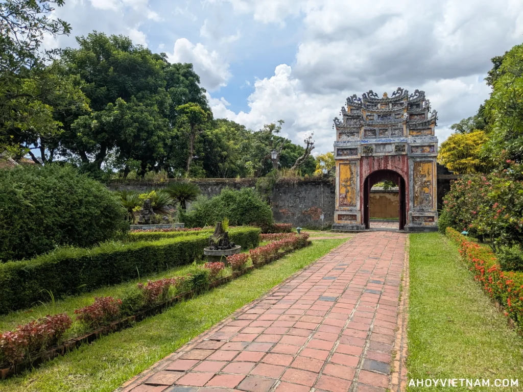 A stone path leading to an ornamental gate inside Hue's Imperial City