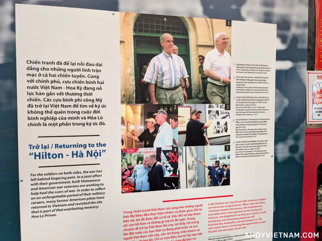 A display showing an older John McCain visiting Hoa Lo Prison in Hanoi