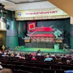 Guests taking their seats inside the Lotus Water Puppet Theatre in Hanoi, Vietnam