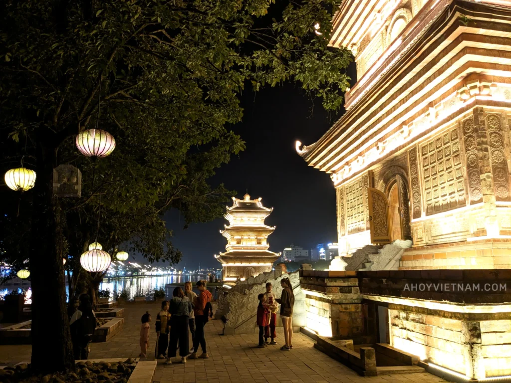 Two towers lit up at night in Hoa Lu Old Town in Ninh Binh, Vietnam
