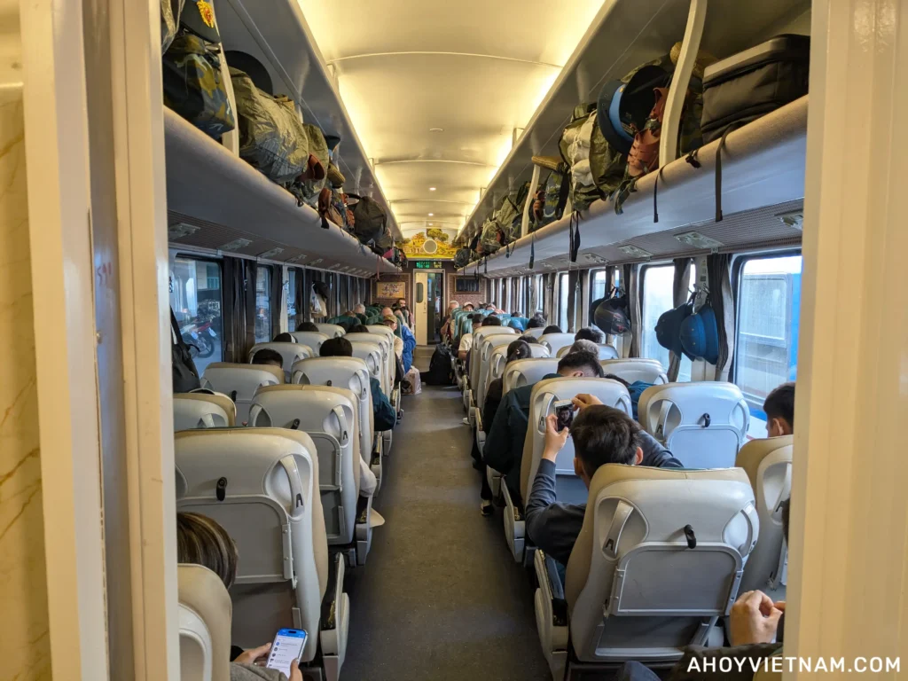 People sitting in their seats on the train from Hanoi to Ninh Binh in Vietnam
