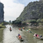 Tourists on the Tam Coc boat tour in Ninh Binh, Vietnam