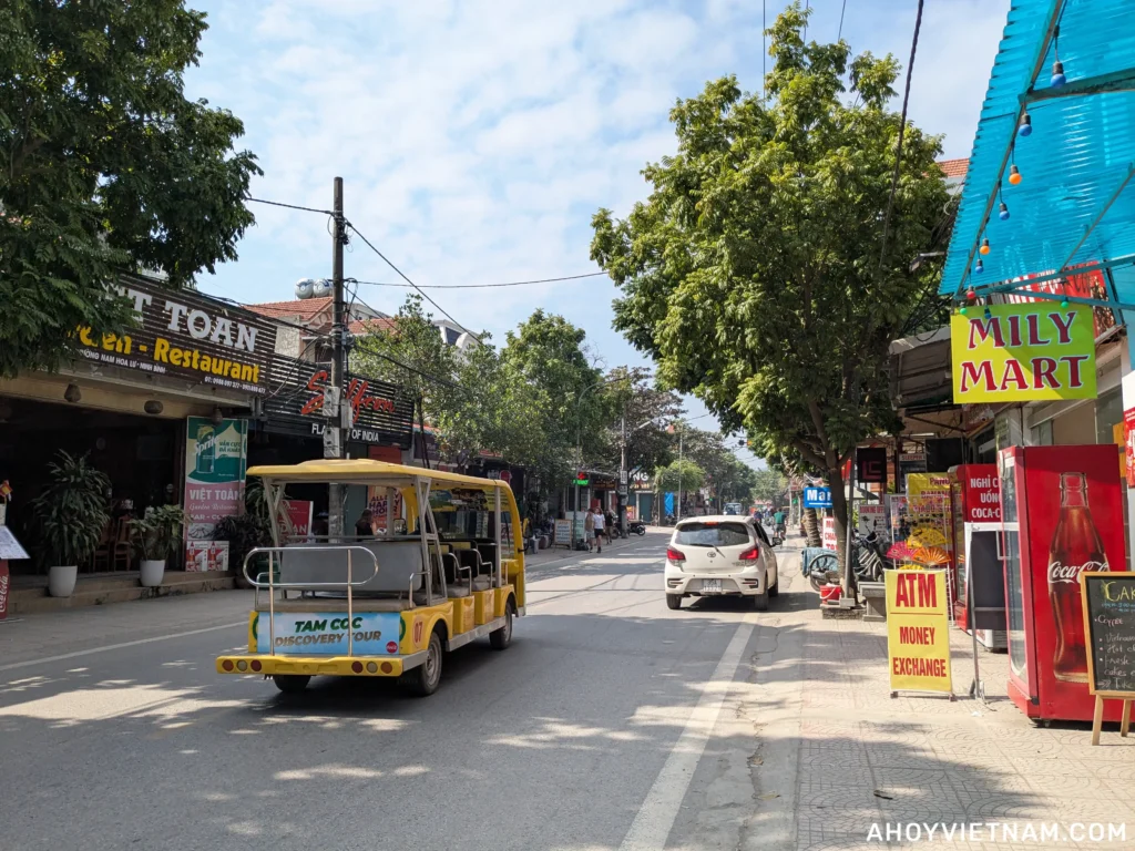 Restaurants, shops, and a golf cart for tourists in the Tam Coc area of Ninh Binh, Vietnam 