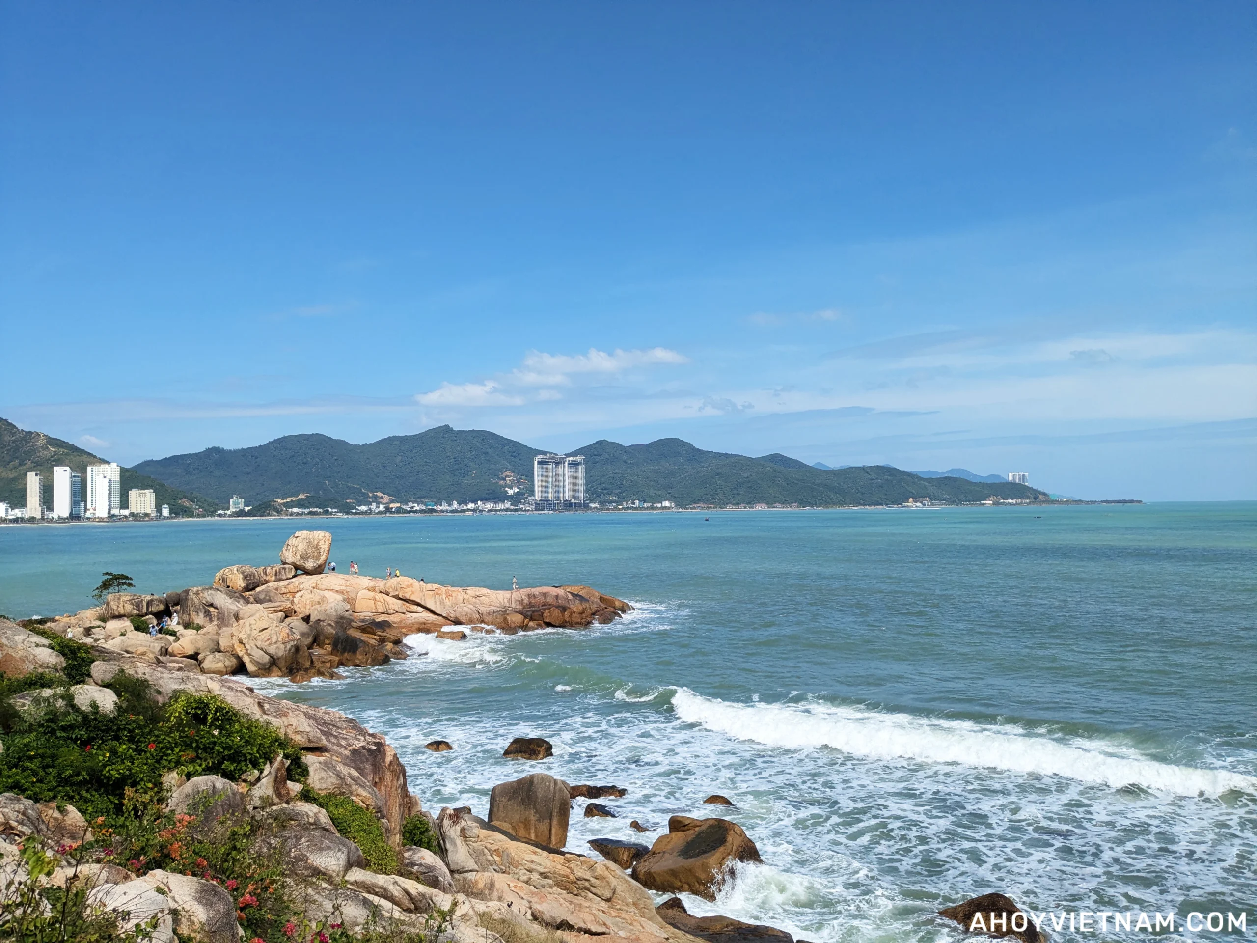 People on the rocks in the ocean at Hon Chong in Nha Trang, Vietnam
