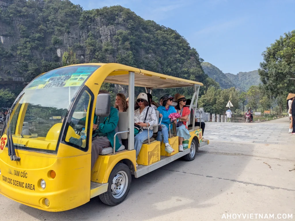 Tourists riding a shuttle during a tour in Ninh Binh, Vietnam