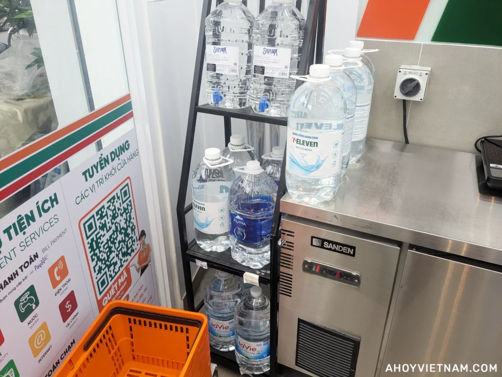 A rack of 5L water jugs inside a 7-Eleven in Ho Chi Minh City, Vietnam